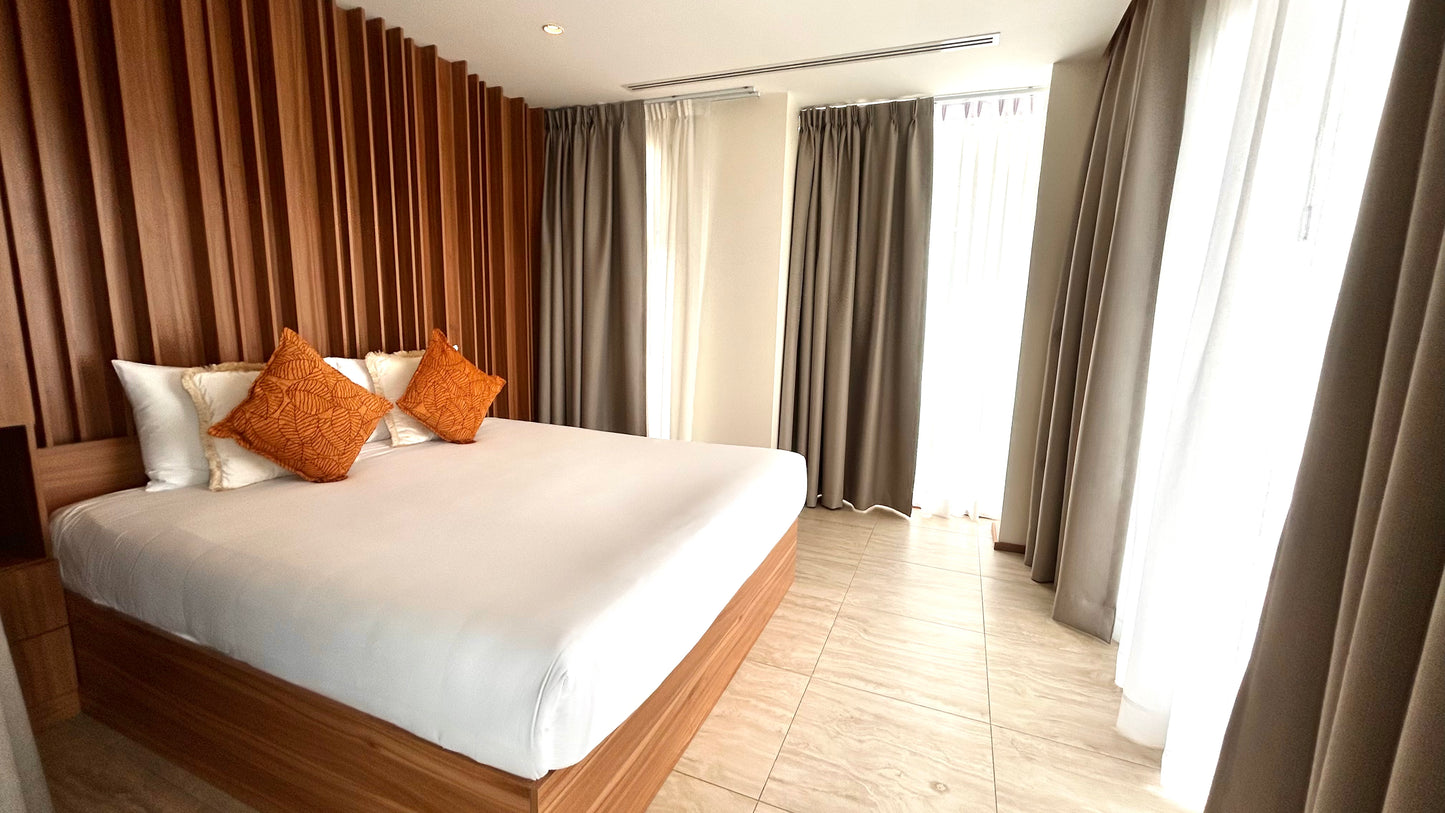 Lake view 3-bedrooms apartment in Bangtao beach (roof top with swimming pool and bbg, large terrace and living room)